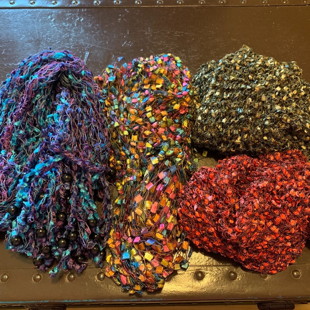 Bundle of four crochet scarves